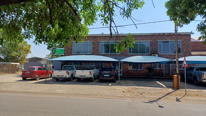 Industrial Property For Sale in Fochville Central: Workshop, Offices, Living Quarters, Parking.