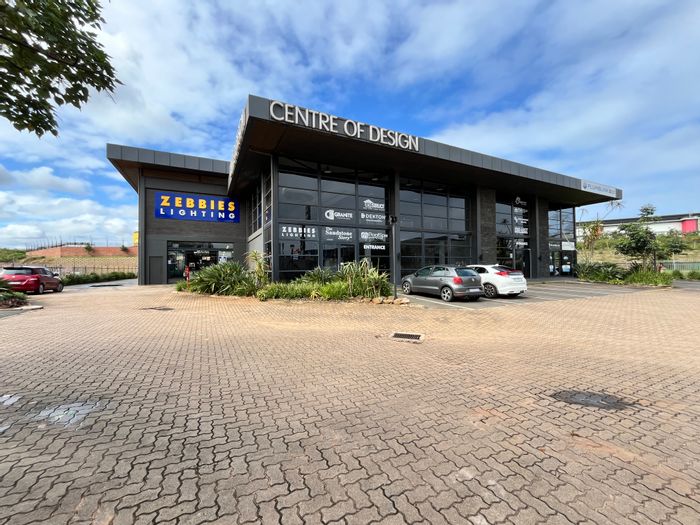 Retail space to rent in Ballito Commercial District with double-volume design and lift access.