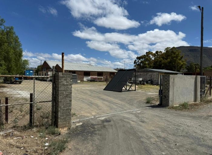 Industrial property for sale in Graaff-Reinet Central with ample storage and office space.