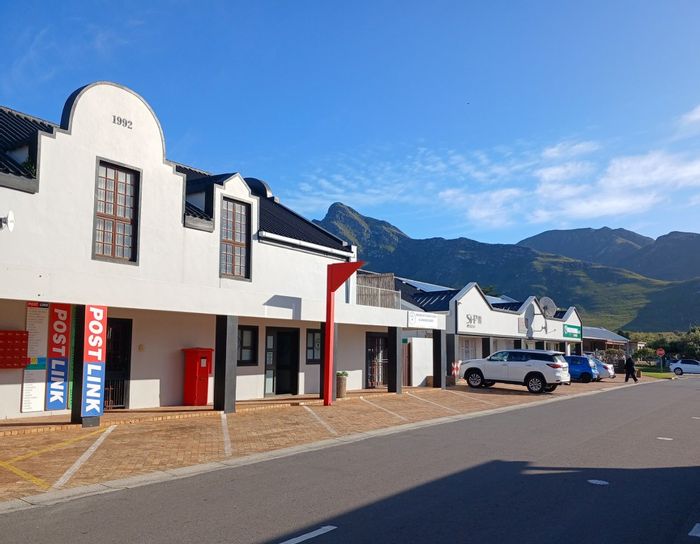 For Sale: Commercial building in Kleinmond Central with residential units and parking.