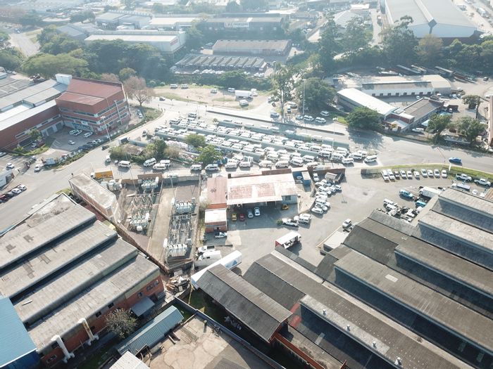 Industrial warehouse in New Germany to rent, features large roller door and shared yard.