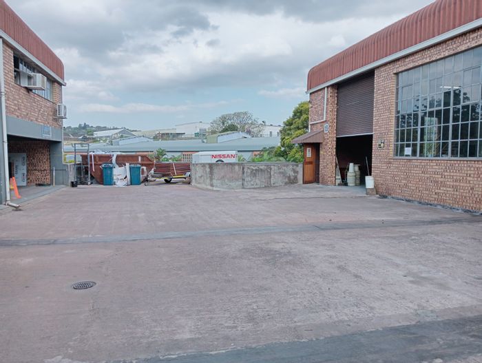 Industrial space to rent in New Germany with ample parking and loading docks.