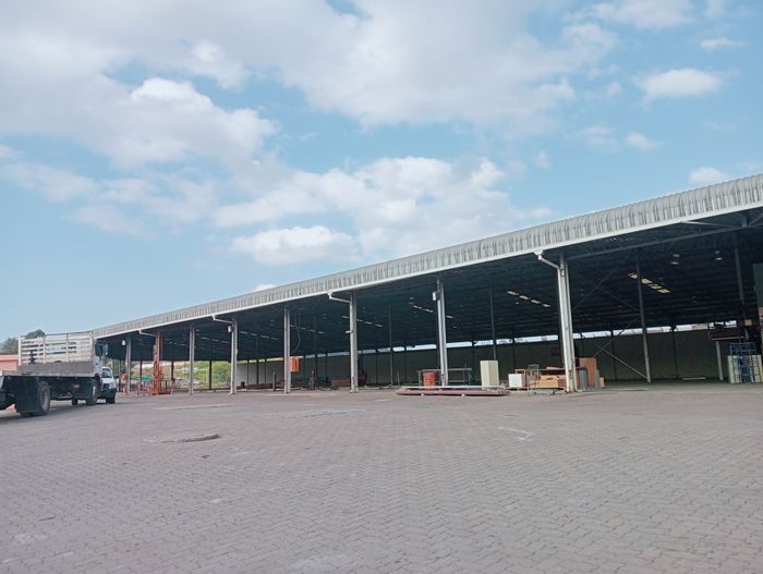 Industrial Warehouse with Offices for Rent in New Germany, featuring large yard and 3-phase power.