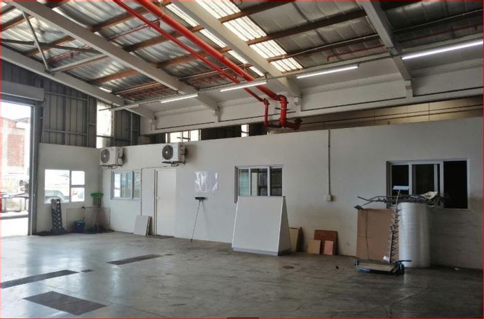 Industrial space to rent in New Germany with security, offices, and large warehouse.