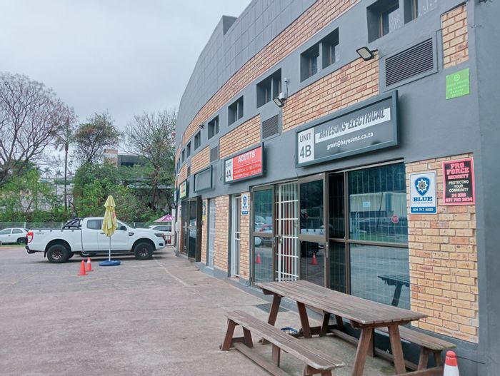 For Sale: Industrial property in Alexander Park with dual entrances and ample parking.
