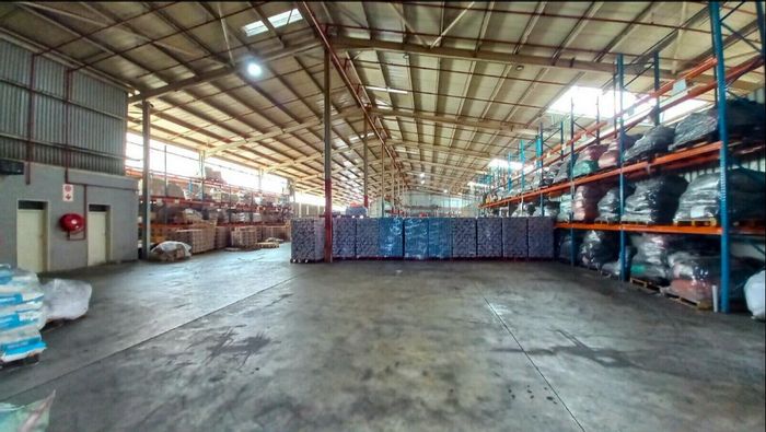 Industrial property to rent in Isipingo Beach with secure yard and dual warehouses.