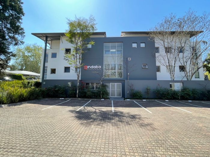 Office To Rent in Bryanston: 162m2 with private offices, boardroom, and outdoor area.