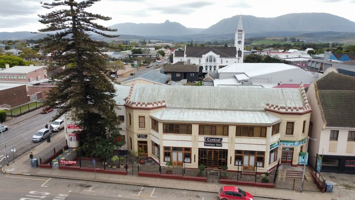 For Sale: Riversdale Central Hotel with 12 rooms, shops, and conference space.
