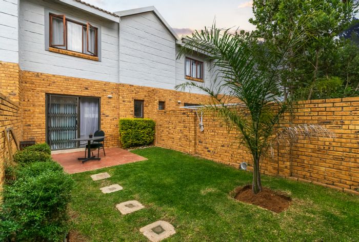 For Sale: Blue Hills Townhouse with 2 Bedrooms, private garden, and secure parking.