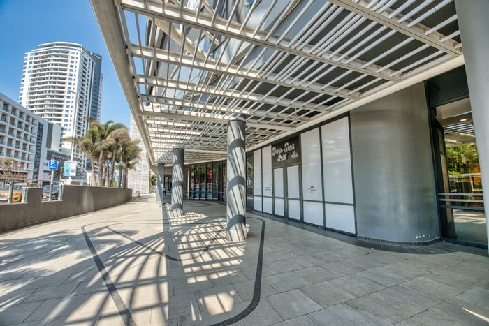 Commercial space to rent in Umhlanga Central, featuring outdoor seating and high visibility.