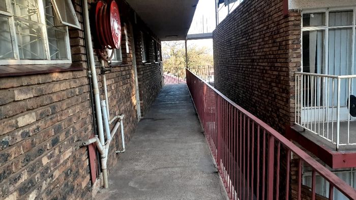For Sale: 2-Bedroom Flat in Vanderbijlpark Cw 2 with Secure Parking.