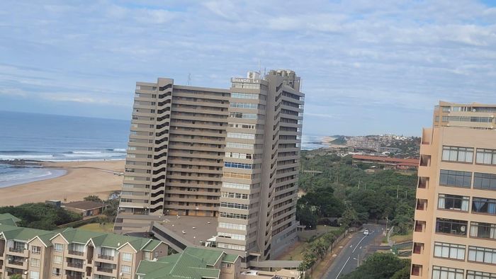 Flat for Sale in Doonside: Sea views, pool, braai areas, 24-hour security.