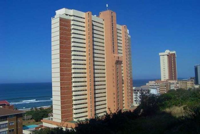 For Sale: Townhouse in Amanzimtoti Central with pool, garden, and secure parking.