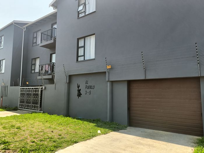 For Sale: Townhouse in Athlone Park with secure parking, near shopping and freeway access.