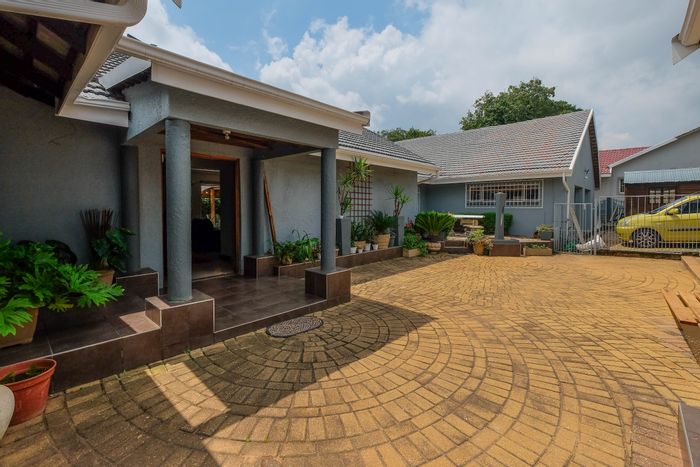 For Sale: Spacious Monument House with pool, entertainment area, and garden flat.