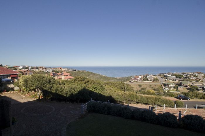 For Sale: House in Dana Bay with 11 guest units, pool, and ocean views.