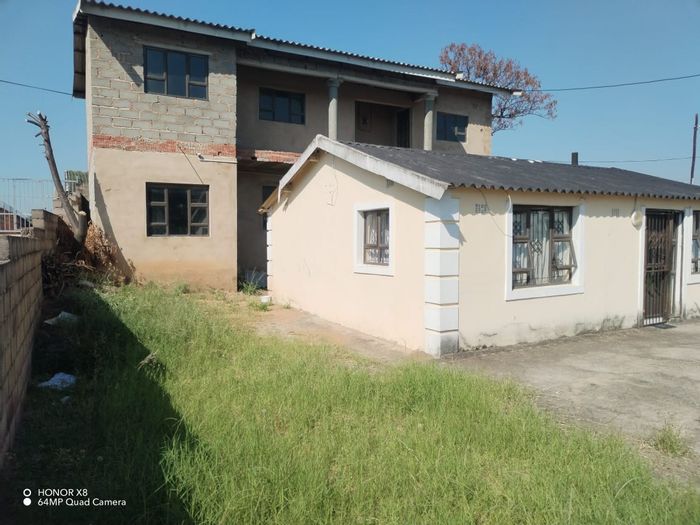 For Sale: Umlazi Central House with two homes, parking for 8 vehicles.