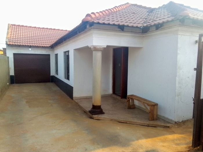 3-Bedroom House For Sale in Kagiso with spacious yard and garage.