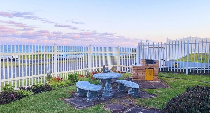 For Sale: Townhouse in Manaba Beach, steps from the shoreline, secure complex amenities.