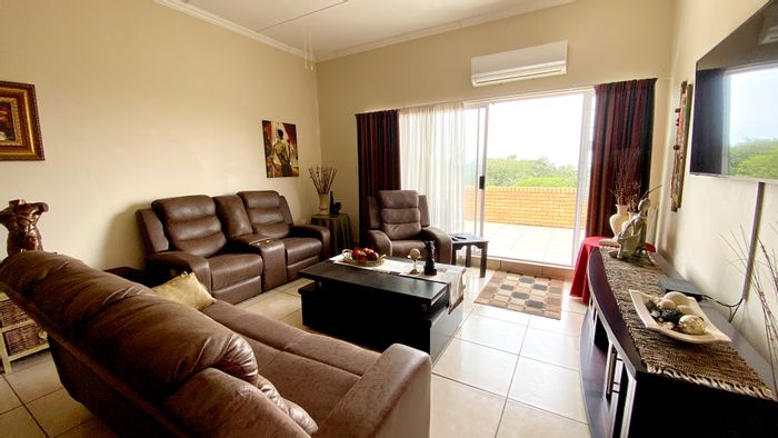 Elysium Central Apartment For Sale: 3 bedrooms, beach access, spacious balcony, secure complex.