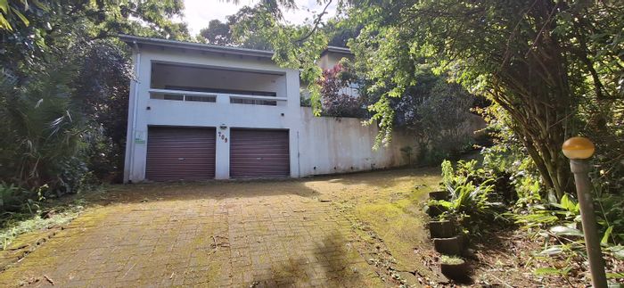 Unique multi-level house for sale in Glenmore with garden, garage, and security.