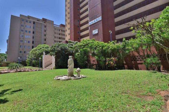 Amanzimtoti Flat For Sale: Sea-facing, 2 bedrooms, pool, braai area, parking.