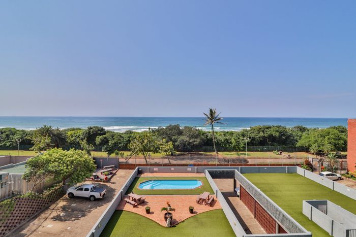 Amanzimtoti Flat For Sale: 3 Bedrooms, sea views, pool, secure garage, easy beach access.