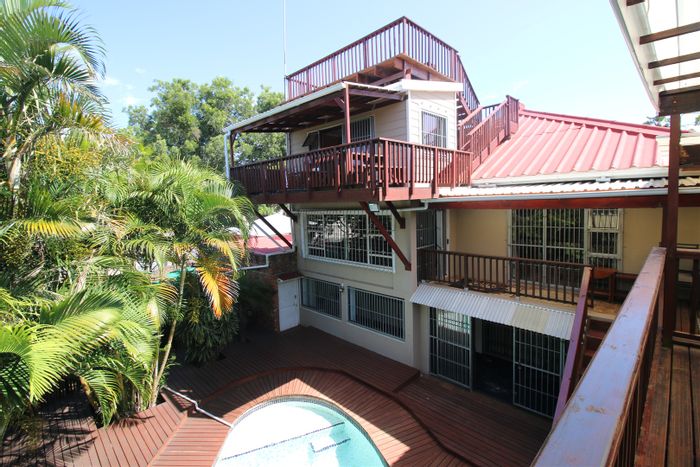 For Sale: Spacious Vincent house with cinema, multiple decks, and two flats.