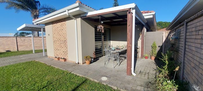 2-bedroom townhouse for sale in Kwelera, featuring secure estate, water tank, and solar geyser.