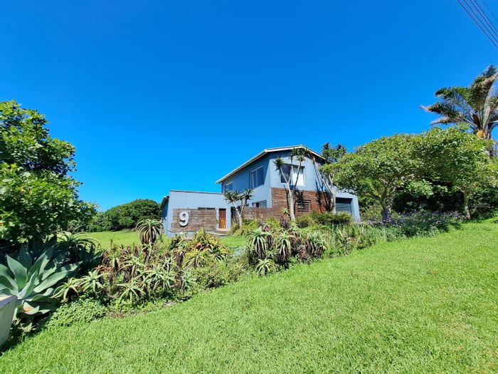 For Sale: House in Sunrise On Sea with beach access, spacious erf, and sea views.