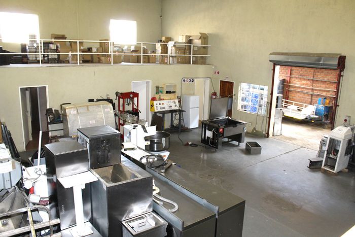 Commercial warehouse for sale in Prosperita, featuring versatile space and ample parking.