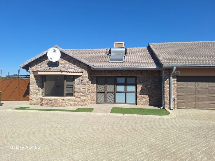 For Sale: Okahandja Central Townhouse with 3 bedrooms, double garage, pet-friendly.