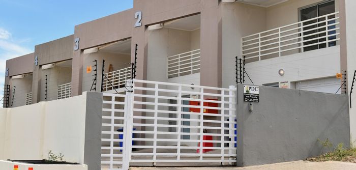 For Sale: Townhouse in Windhoek Central, 2 beds, garage, near city center.