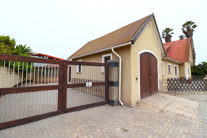 House for Sale in Swakopmund Central: Prime location, renovation potential, and investment opportunities.