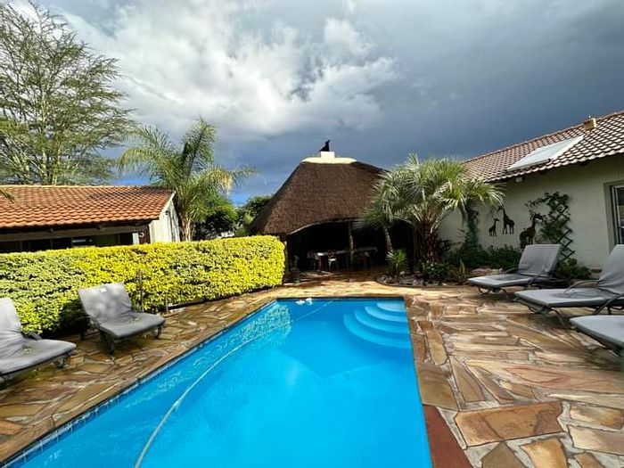 8-Bedroom Guest House For Sale in Otjiwarongo Central with Pool and Garden Amenities.