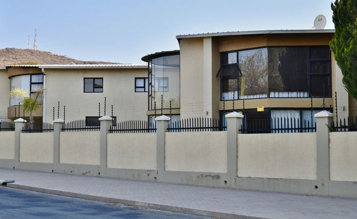 For Sale: Spacious Klein Windhoek townhouse with 3 bedrooms, double garage, and security features.