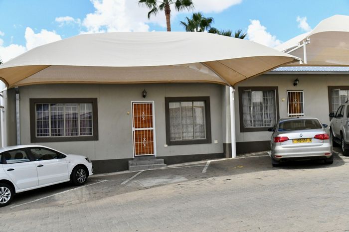 For Sale: Townhouse in Pioneers Park with 2 bedrooms, courtyard, and covered parking.