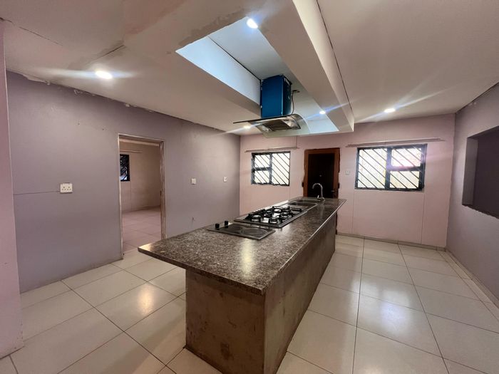 For Sale: Spacious 4-bedroom house in Otjiwarongo Central with double garage and remote gate.