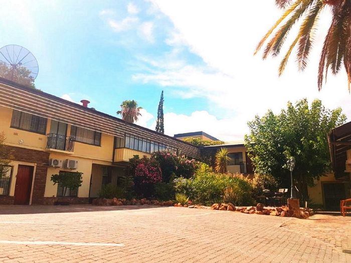 For Sale: Guest House in Windhoek Central with 19 rooms, pool, and secure parking.