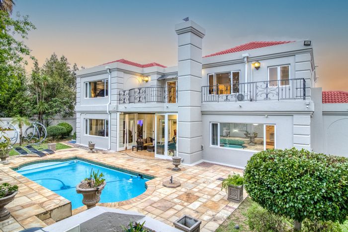 For Sale: Dainfern Golf Estate house with 4 bedrooms, pool, and golf course views.