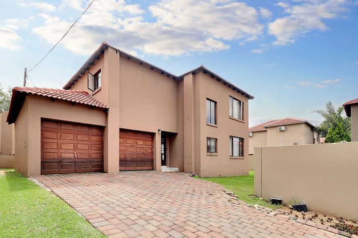 For Sale: House in Craigavon with open-plan living, double garage, and secure complex.
