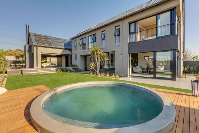 House For Sale in Helderfontein Estate: 4 beds, 4.5 baths, lease in place.