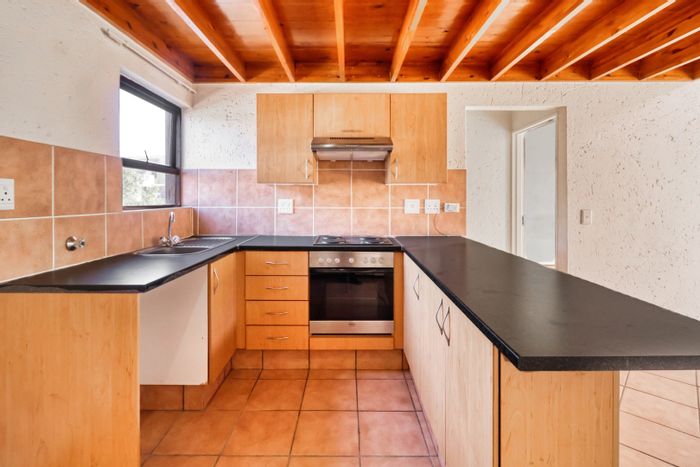 Lonehill Apartment For Sale: One-bedroom unit with loft, patio, and tenant in place.
