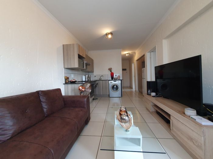 For Sale: 2-Bedroom Apartment in Paulshof with Pool, Clubhouse, and 24-Hour Security.