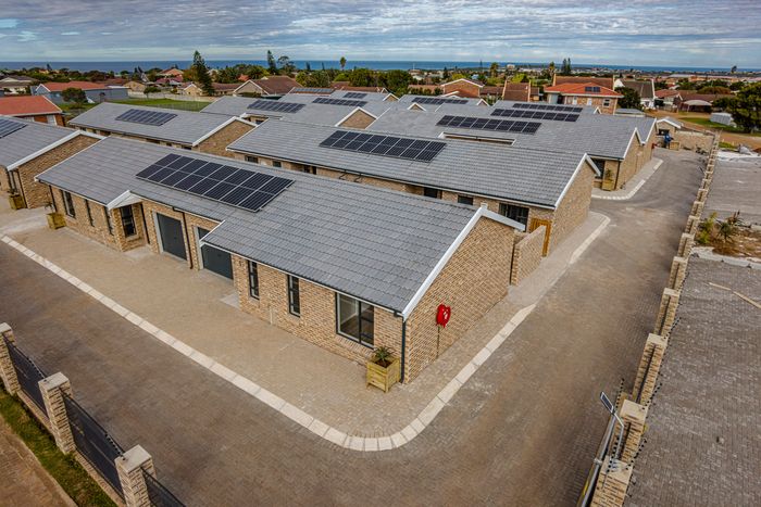 For Sale: Townhouse in C Place with off-grid living, secure complex amenities.