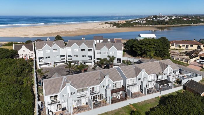 Coastal Townhouse in Aston Bay for Sale: Sea views, secure complex, outdoor entertaining.