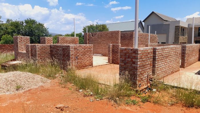 Half-built house for sale in Leloko Lifestyle & Eco Estate with approved plans.