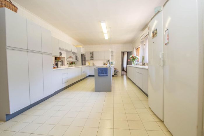 For Sale: Versatile Small Holding in Knoppieslaagte with Cottages, Stables, and Pool.
