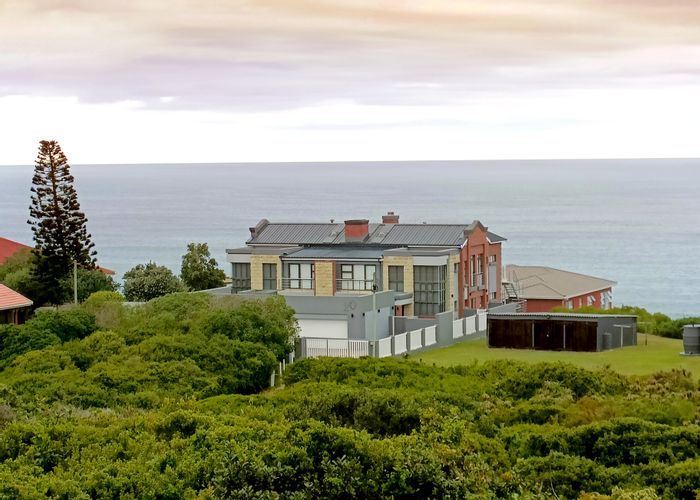 For Sale: Dual House in Reebok with ocean views, pool, and investment potential.