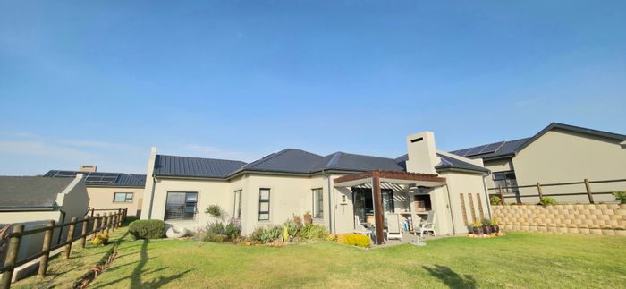 For Sale: House in Hartland Lifestyle Estate with 3 bedrooms, garage, and patio.